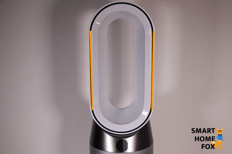 The Dyson air purifier is blown out of the oval air outlet.